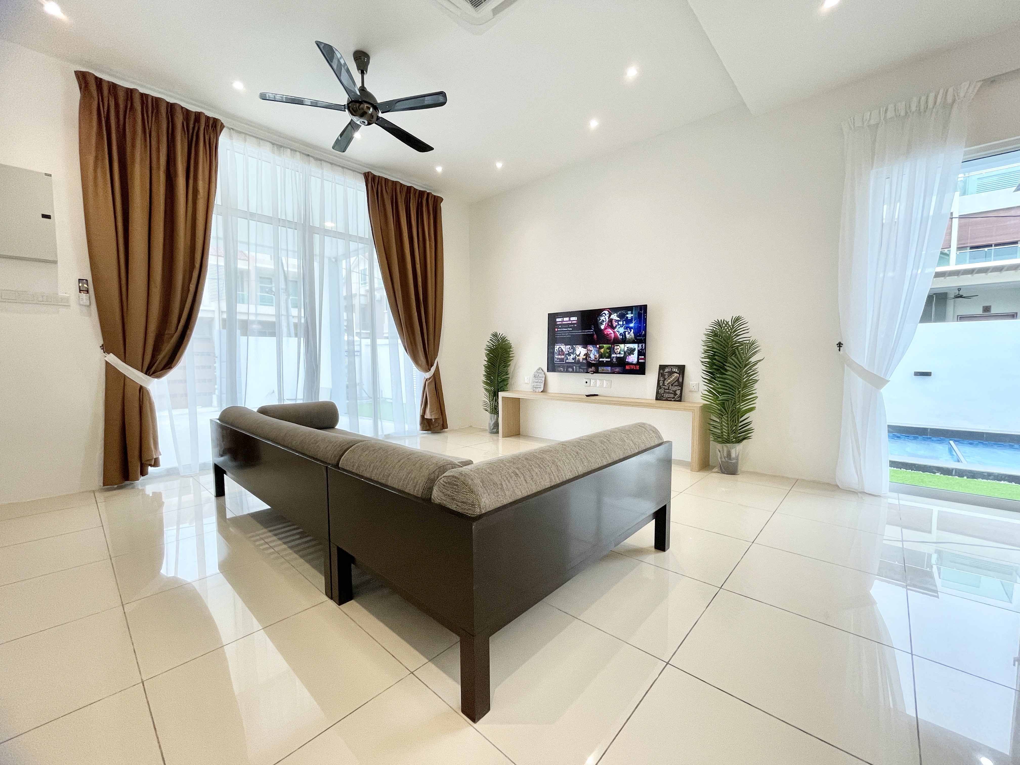 Open plan living room in Langkawi villa with bright spacious interior — BNB Management property